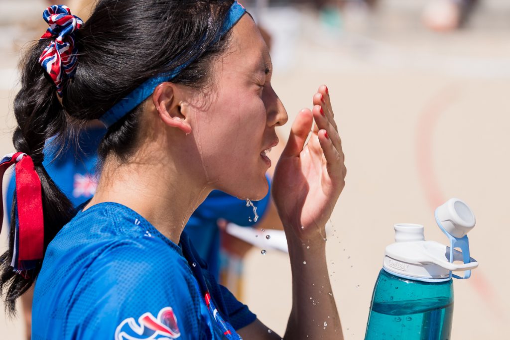 Karen Kwok of Great Britain cools down between points. Photo by Tino Tran.