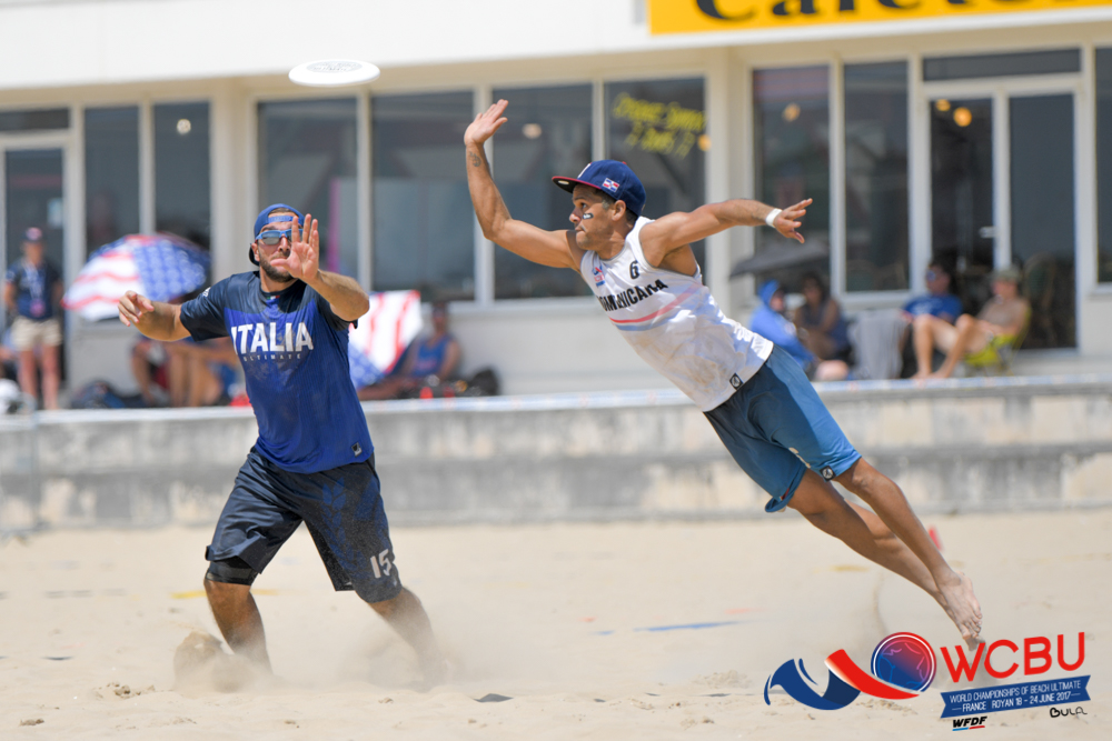 Carlos Gross lays out for a block against Italy. Photo by Deepthi Indukuri.