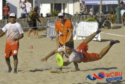 A Mexican player makes a great layout catch against Netherlands Mixed. Photo by Deepthi Indukuri.